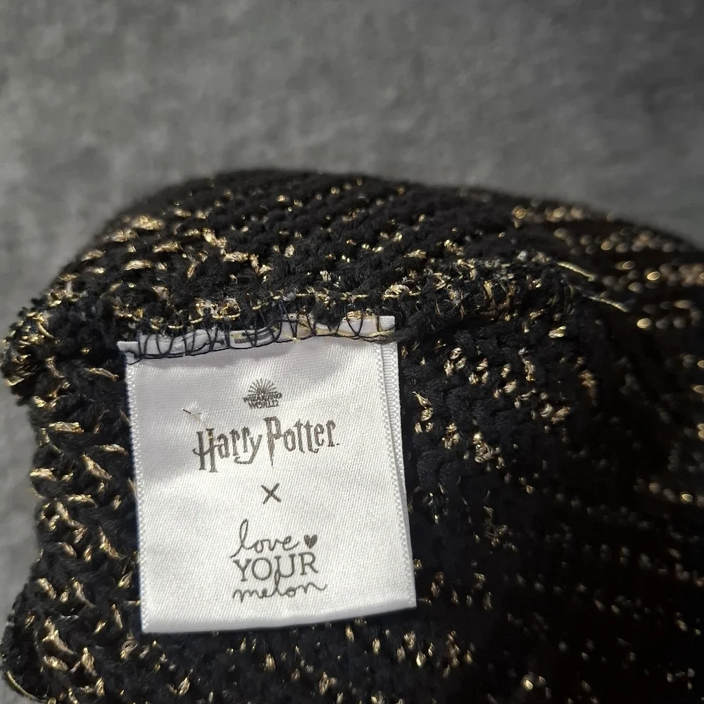 Love Your Melon Harry Potter Snitch Black Metallic Gold Pom Beanie